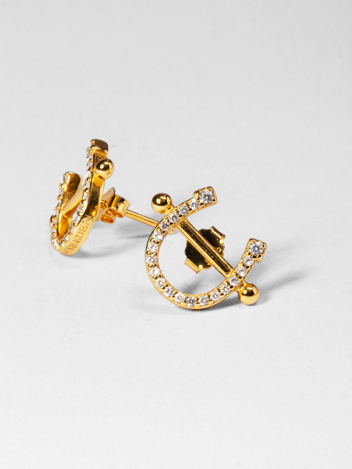 Pierced Horse Shoe Earrings Gold